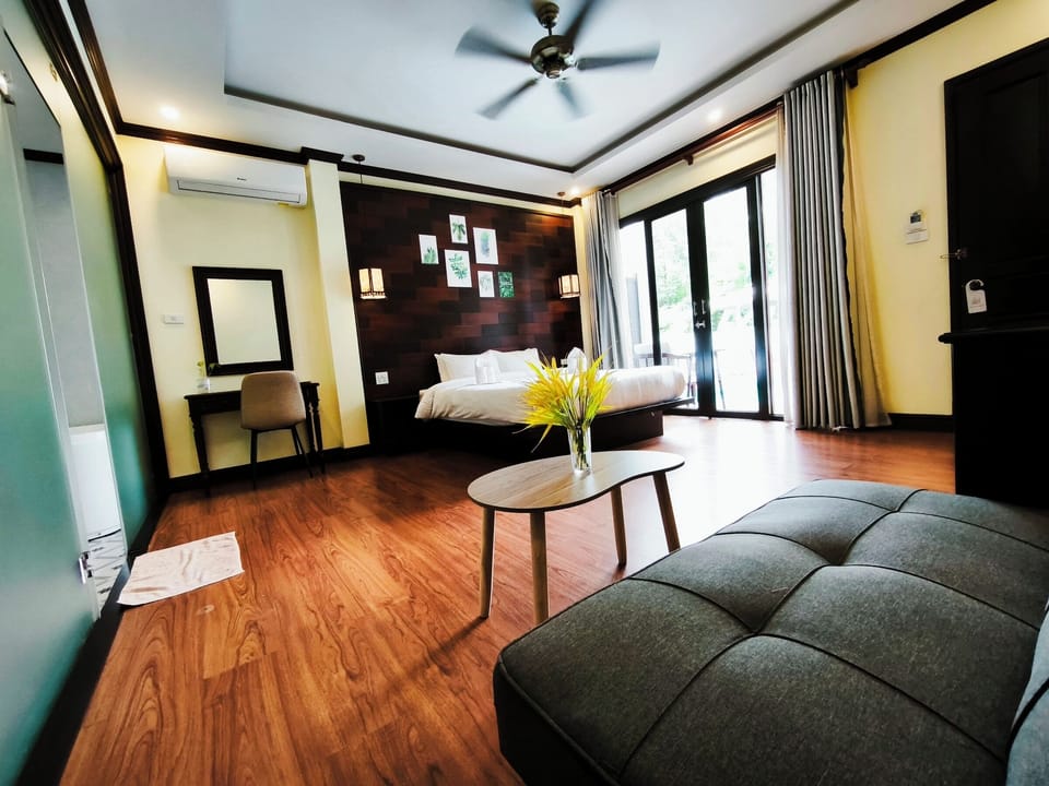 Junior Double Room, Poolside | Living area | Fireplace, printers