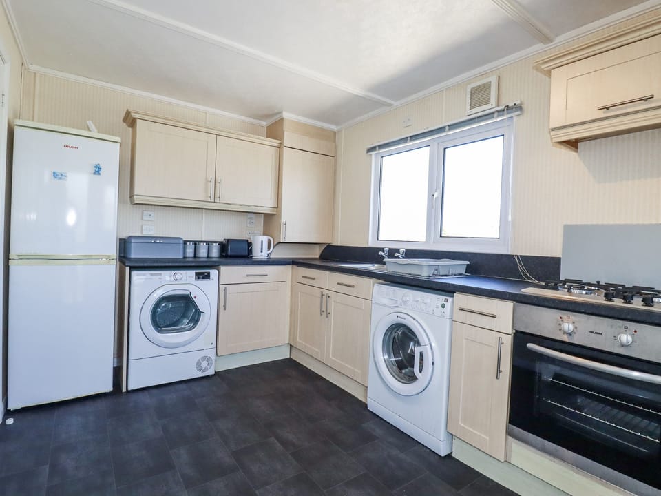 Fridge, toaster, cookware/dishes/utensils