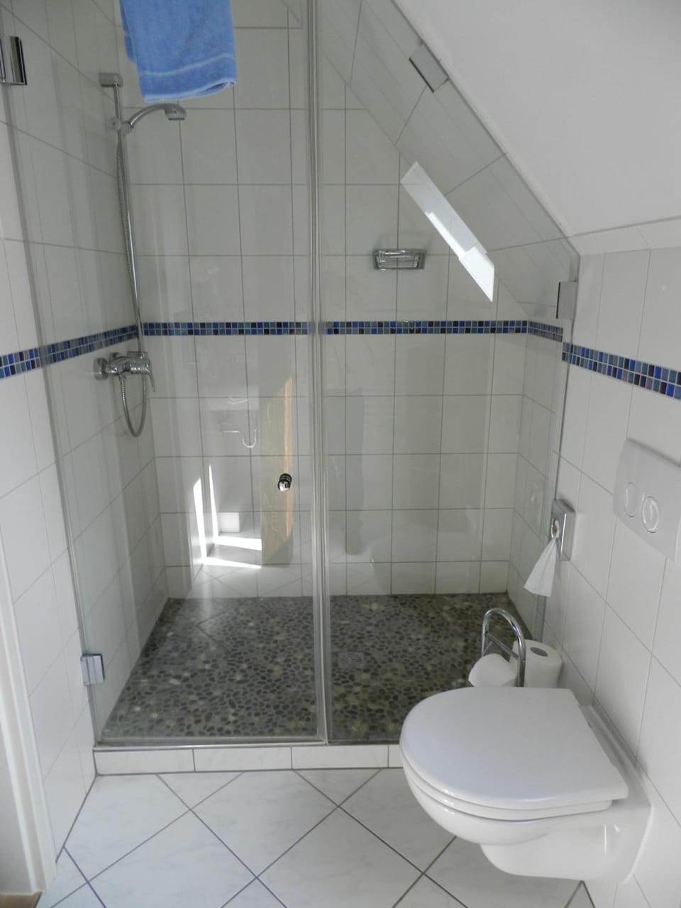 Shower, free toiletries, hair dryer, towels