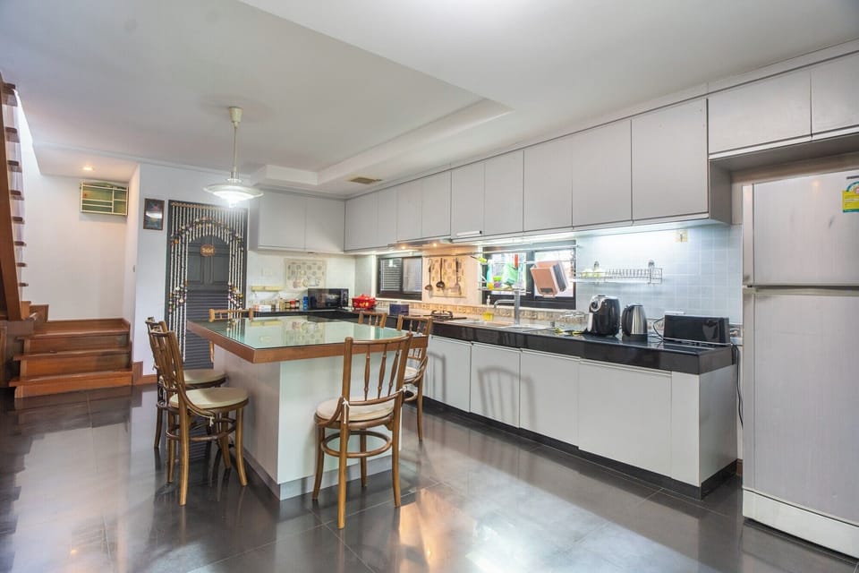 Family Apartment, Multiple Beds, Pool View, Poolside | Private kitchen | Electric kettle, paper towels