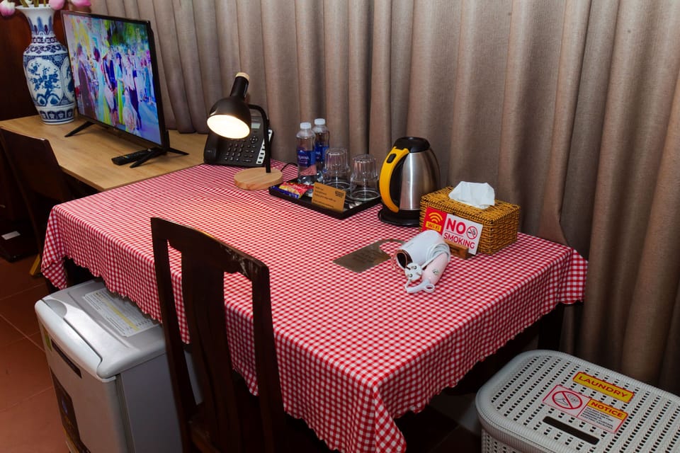 Deluxe Triple Room, City View | Premium bedding, minibar, desk, blackout drapes