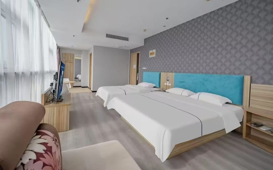 Family Triple Room | Blackout drapes, iron/ironing board (on request), WiFi (free)