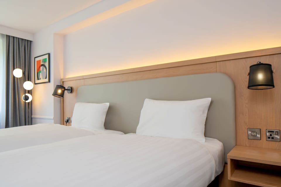 Standard Room, 2 Twin Beds | Desk, laptop workspace, blackout drapes, iron/ironing board