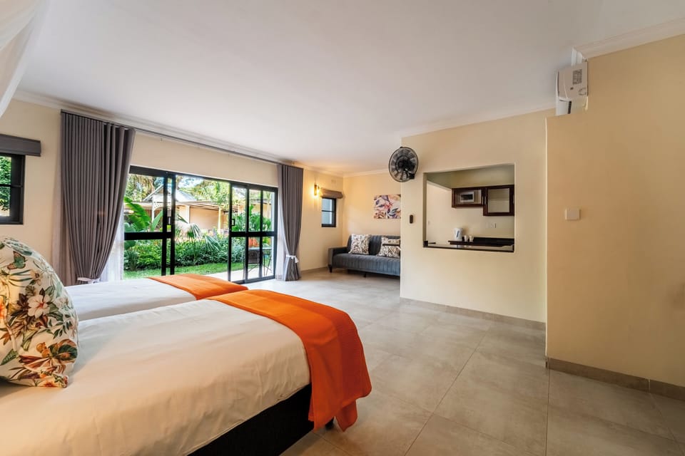 Deluxe Double or Twin Room, Garden View | In-room safe, desk, laptop workspace, blackout drapes