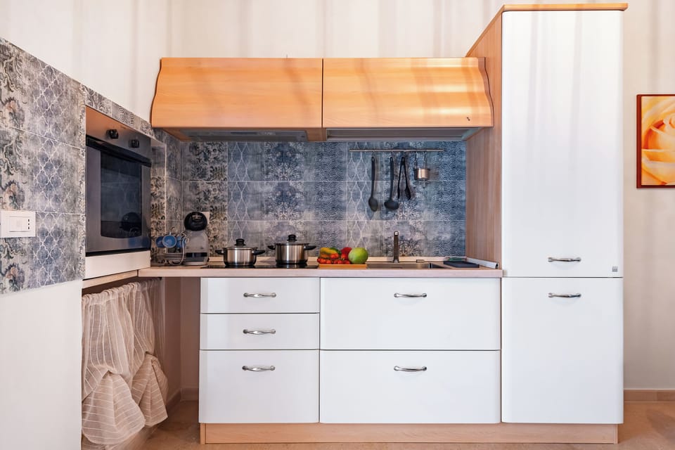 Family Apartment, Multiple Bedrooms (Civico 72 Monopoli) | Private kitchen | Fridge, oven, stovetop, coffee/tea maker