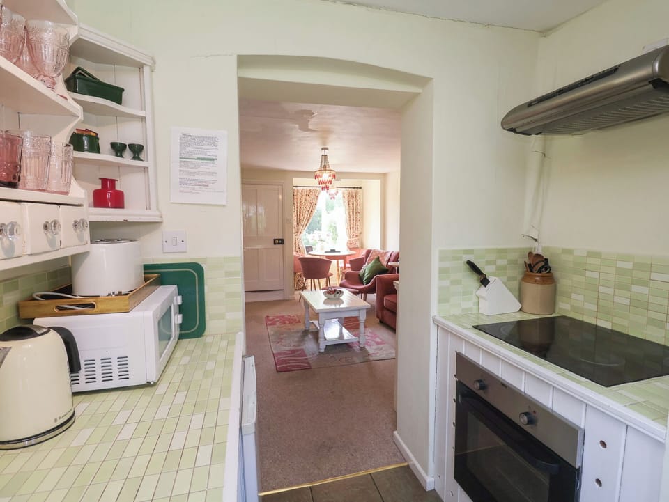 Fridge, microwave, toaster, cookware/dishes/utensils