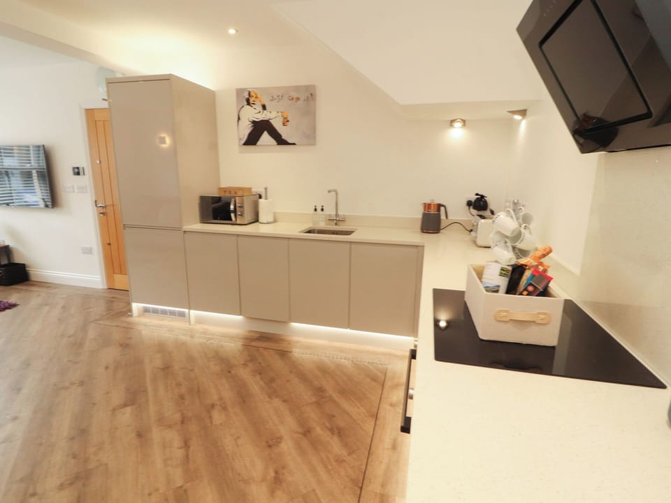 Fridge, microwave, cookware/dishes/utensils