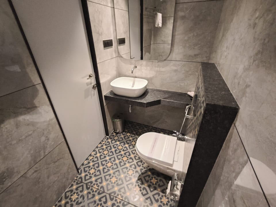 Family Triple Room | Bathroom | Shower, free toiletries, slippers, towels