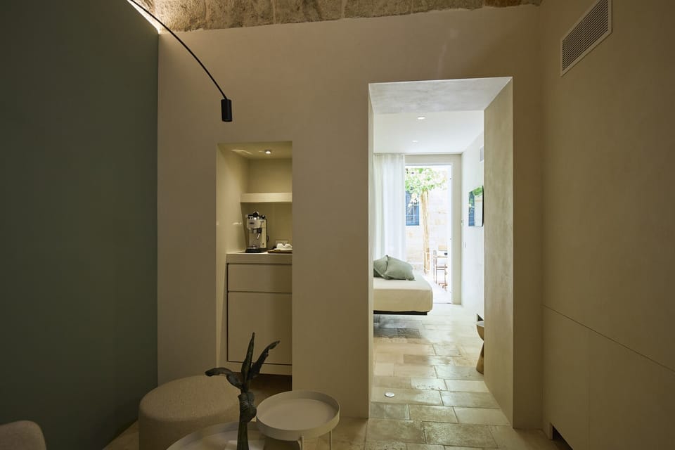  EMERA - Junior Suite with Private Whirlpool Pool & Sea-View Solarium | Living area | 42-inch Smart TV with digital channels