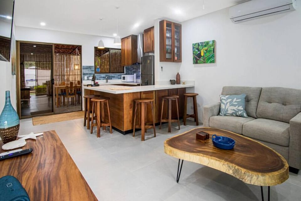 Apartment, Patio, City View | Living area | 42-inch Smart TV with cable channels