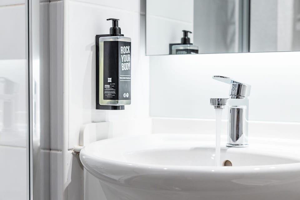 Combined shower/tub, eco-friendly toiletries, hair dryer, towels