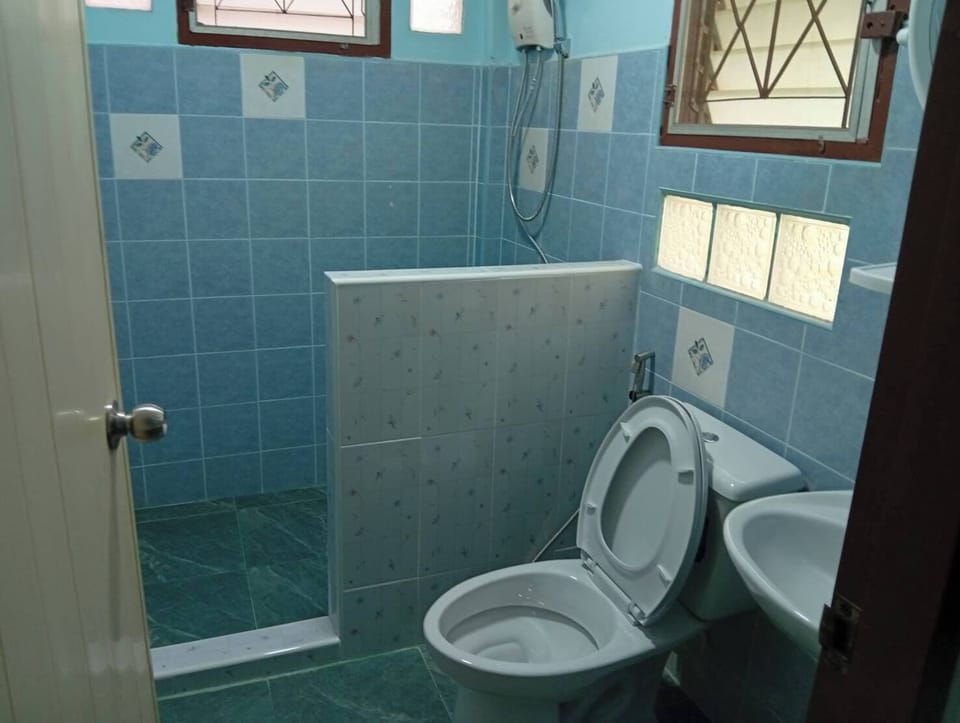 Shower, towels, soap, toilet paper