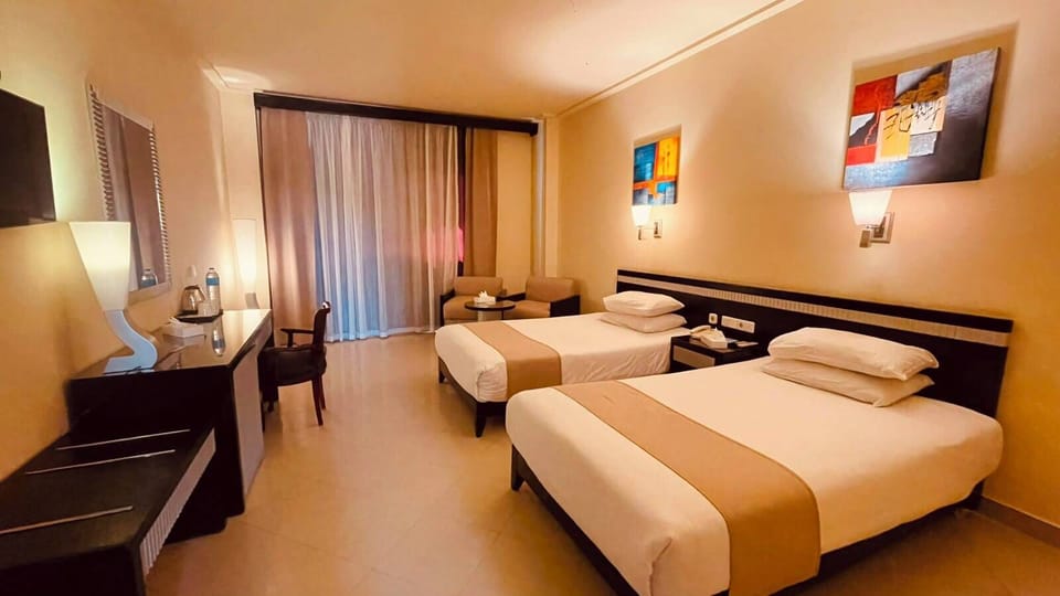 Standard Double or Twin Room, City View | Individually furnished, bed sheets