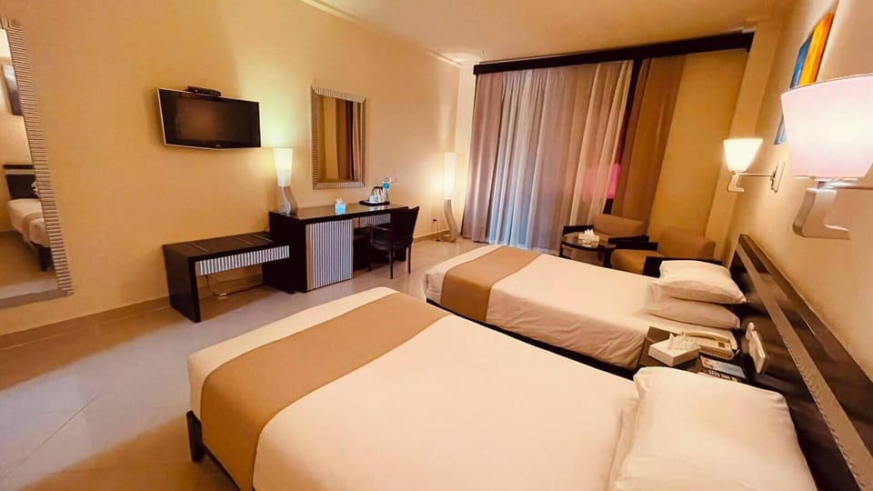 Standard Double or Twin Room, City View | Individually furnished, bed sheets