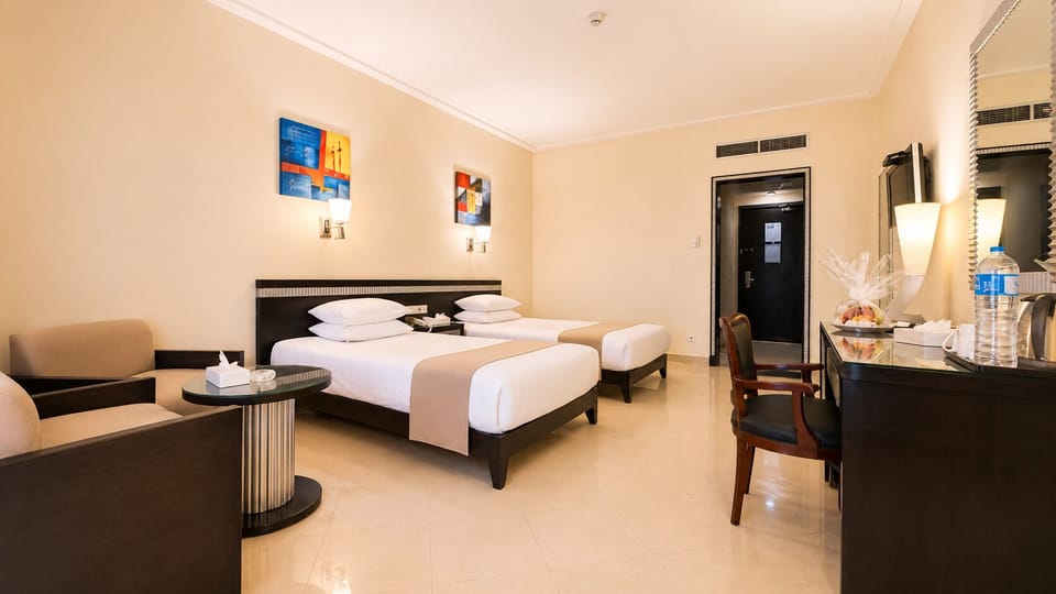 Standard Double or Twin Room, City View | Minibar, individually furnished, bed sheets