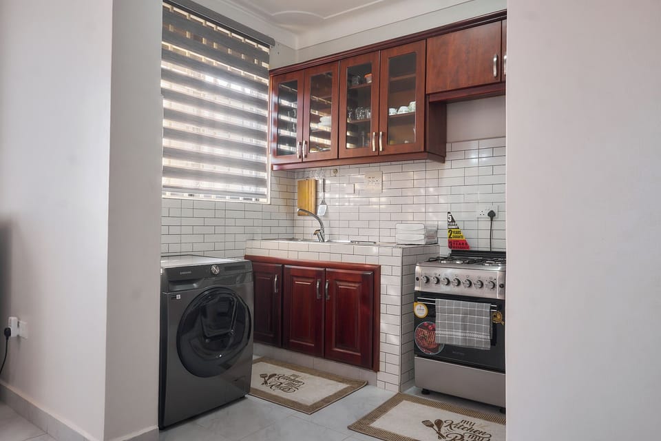 Economy Apartment, City View | Private kitchen | Fridge, microwave, oven, cookware/dishes/utensils