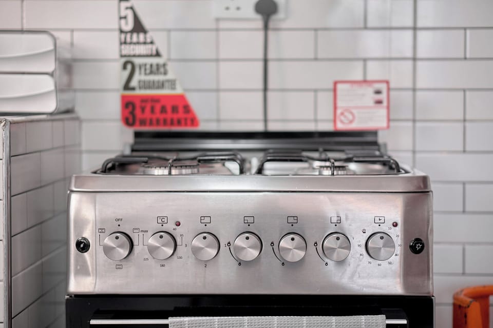 Economy Apartment, City View | Private kitchen | Fridge, microwave, oven, cookware/dishes/utensils