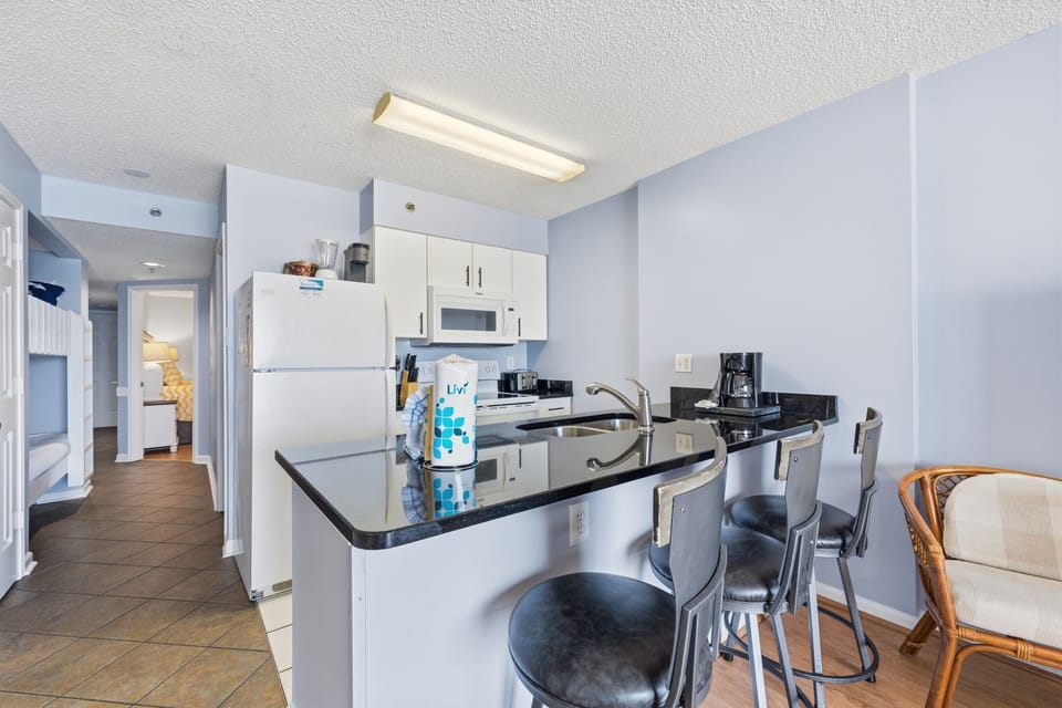 Signature Condo, Balcony, Beach View | Private kitchen | Fridge, microwave, oven, stovetop