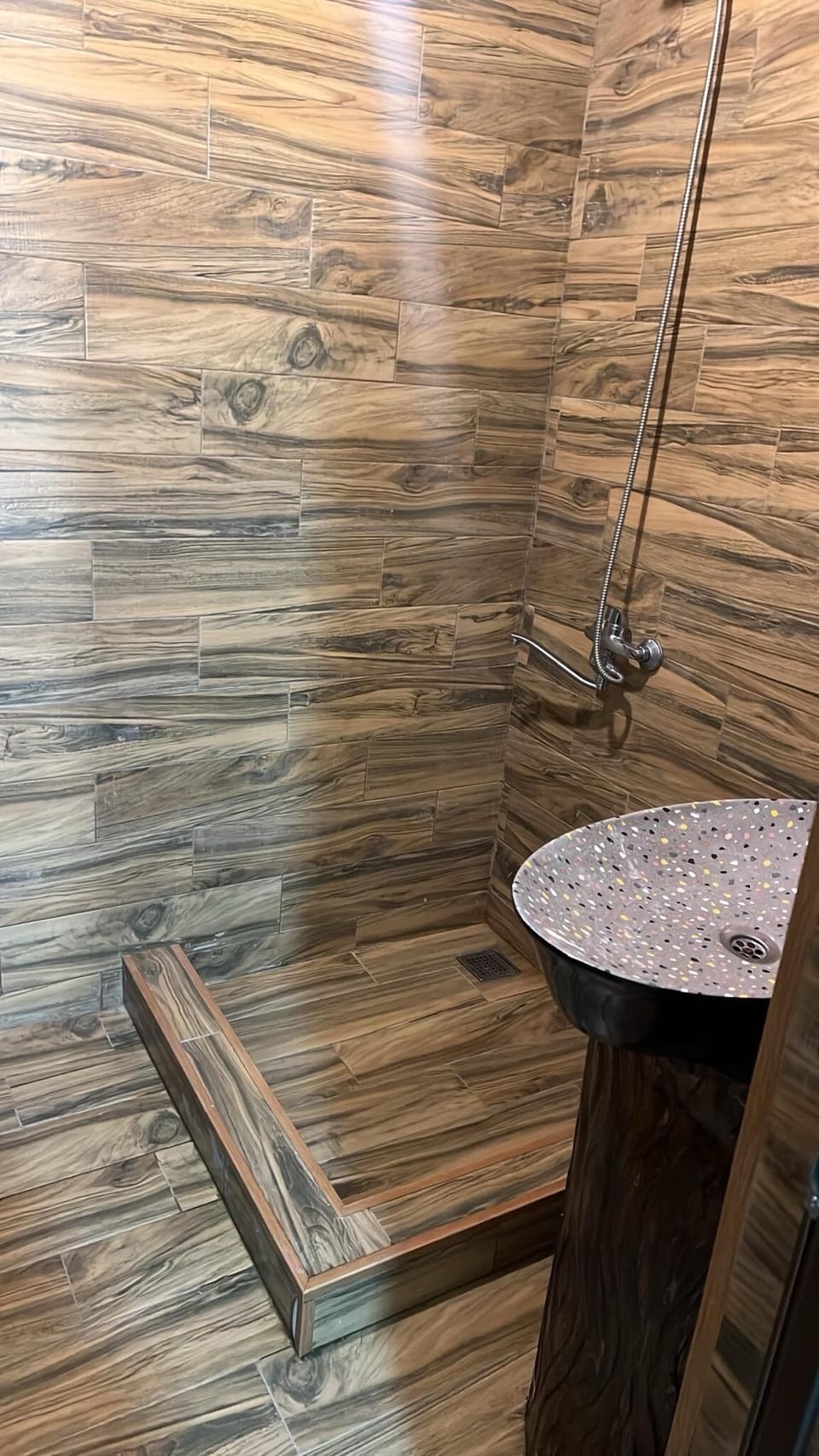 Shower, hair dryer, slippers, towels