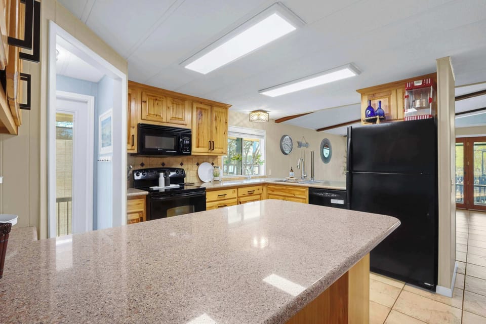 House, Multiple Beds, Patio (Lakeside Playground) | Private kitchen | Coffee/tea maker, fridge, microwave, oven