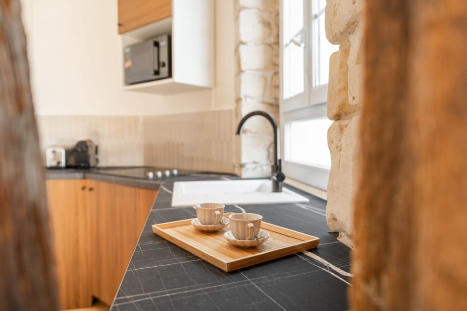Superior Apartment, Courtyard View | Private kitchen | Espresso maker, electric kettle, toaster, freezer