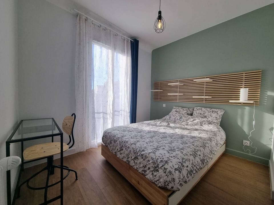 Premium bedding, desk, laptop workspace, blackout drapes