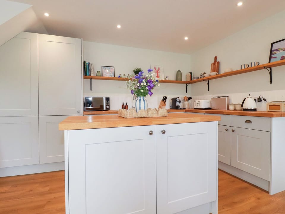 Fridge, dishwasher, toaster, cookware/dishes/utensils