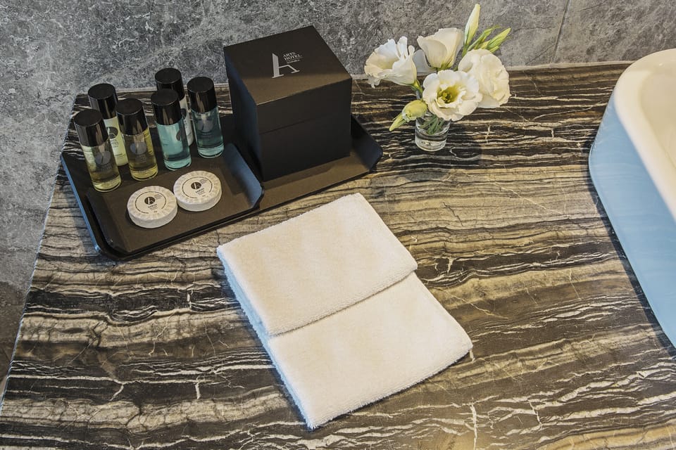 Premium bedding, down comforters, pillowtop beds, minibar