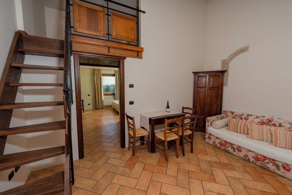 Apartment (Bilocale 2+2) | Living area | Flat-screen TV