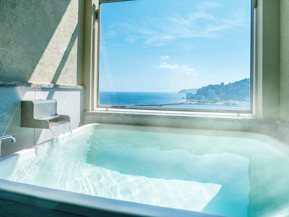 Twin Room with Open Air Bath - East Tower, Non-smoking | Bathroom | Hair dryer, slippers, bidet, towels