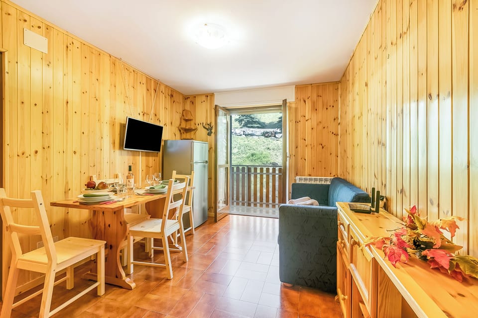 Standard Apartment, Multiple Bedrooms (Appartamento la Cerbiatta) | Living area | 21-inch flat-screen TV with cable channels