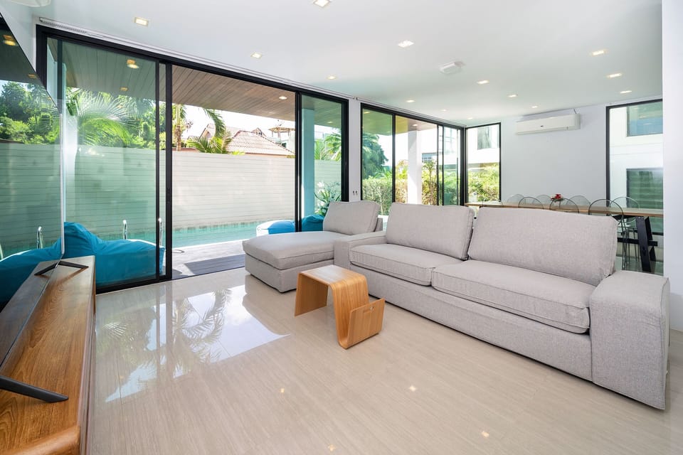 Exclusive Villa, 4 Bedrooms, Private Pool, Garden View | Living area | 36-inch flat-screen TV with cable channels