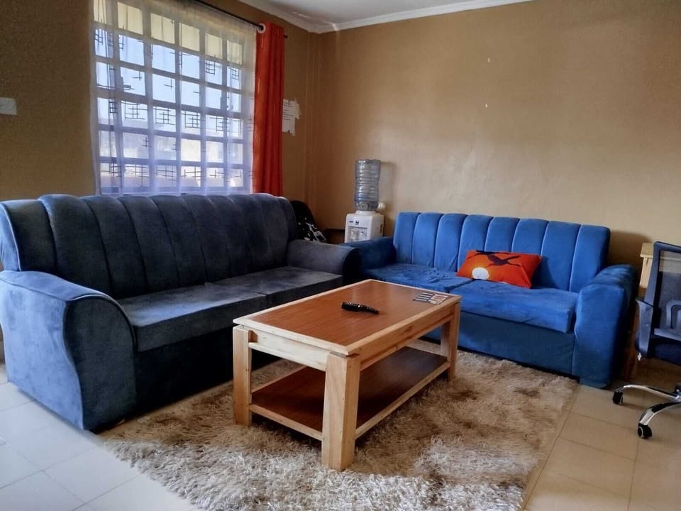 Comfort Apartment, City View | Living area | 24-inch Smart TV with digital channels