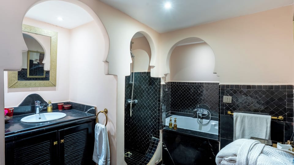 Luxury Suite, Patio, Garden View | Bathroom | Bathrobes