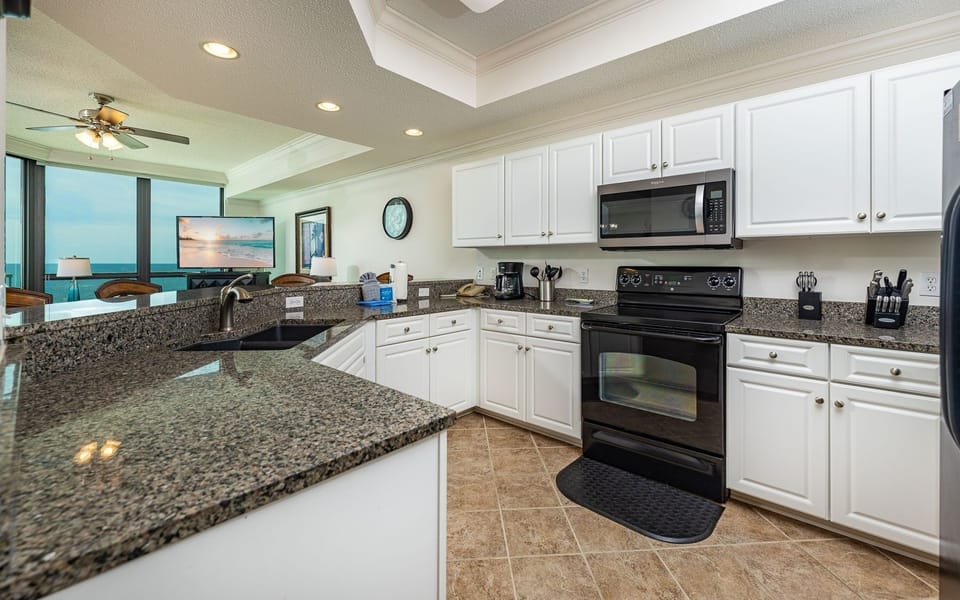 Condo, 2 Bedrooms | Private kitchen | Coffee/tea maker, fridge, oven