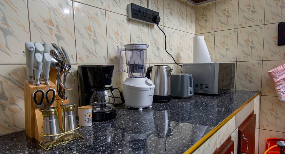 Townhome | Private kitchen | Coffee/tea maker, electric kettle, toaster