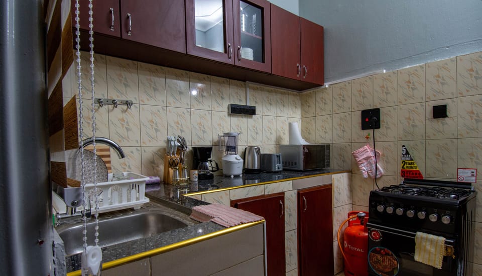 Townhome | Private kitchen | Coffee/tea maker, electric kettle, toaster