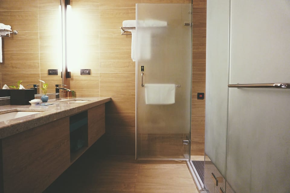 Room, 2 Queen Beds | Bathroom | Shower, rainfall showerhead, hair dryer, slippers