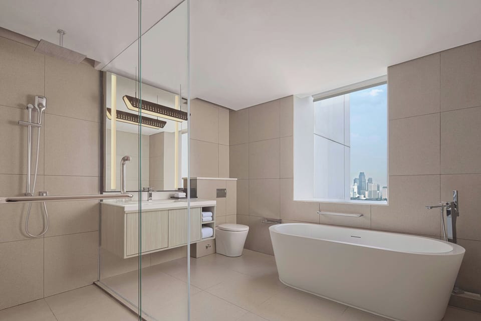 Suite, 1 Bedroom, Non Smoking, City View | Bathroom | Free toiletries, hair dryer, slippers, bidet