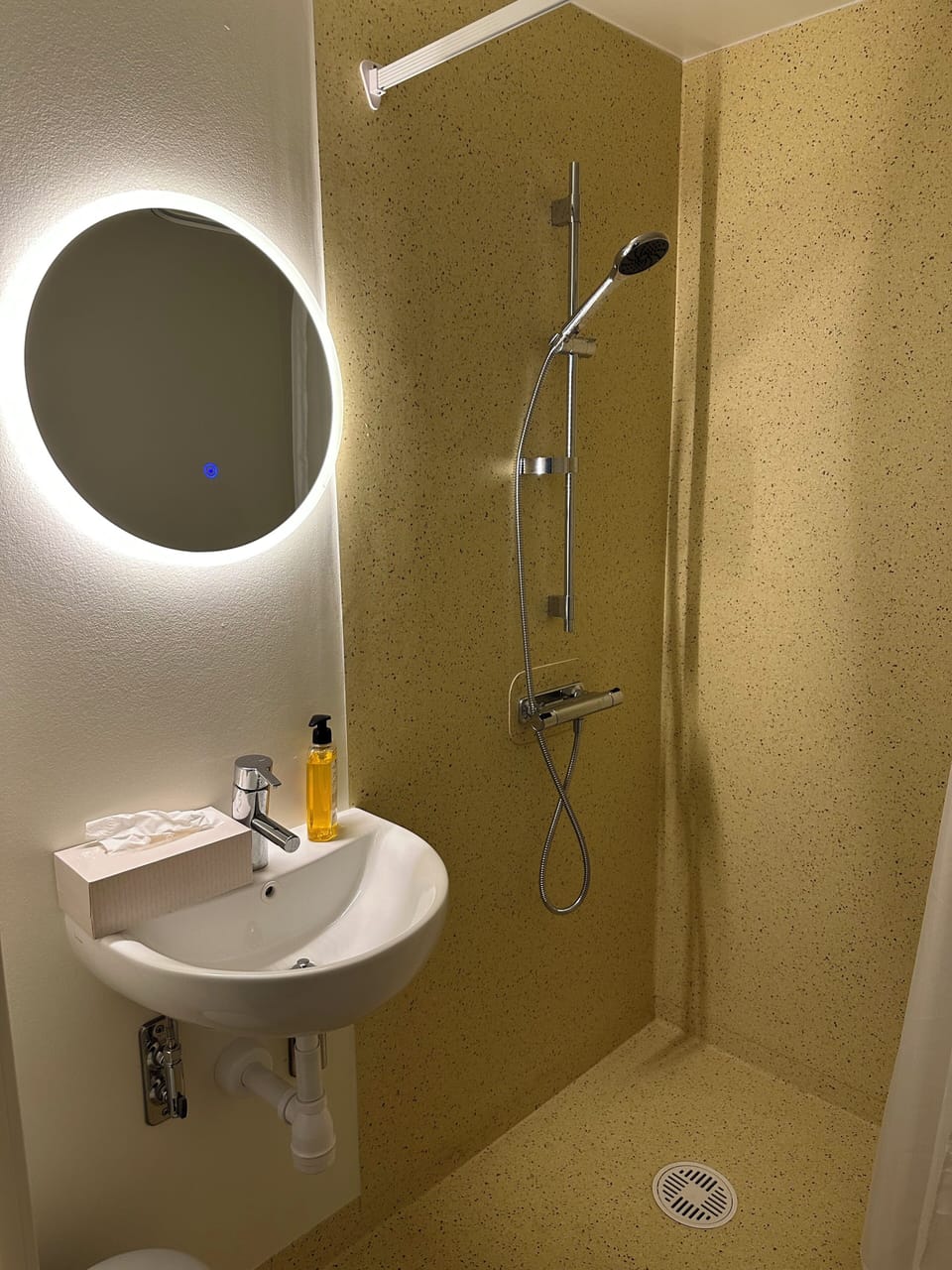 Shower, slippers, towels, soap