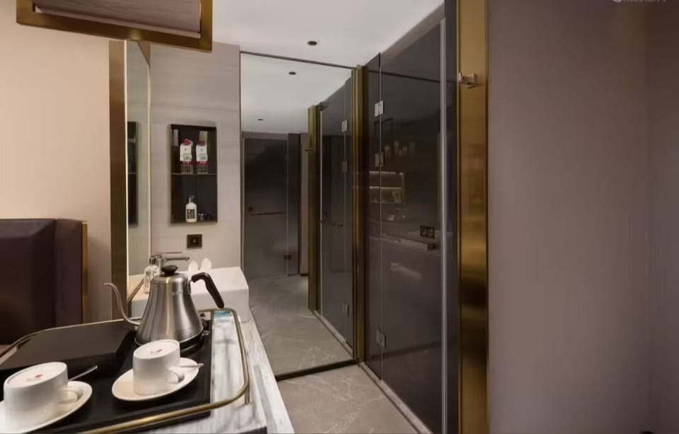 Basic Twin Room, City View | Bathroom | Shower, rainfall showerhead, free toiletries, hair dryer