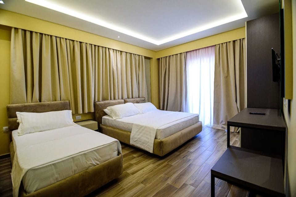 Comfort Triple Room, Balcony, Garden View | Minibar, free WiFi