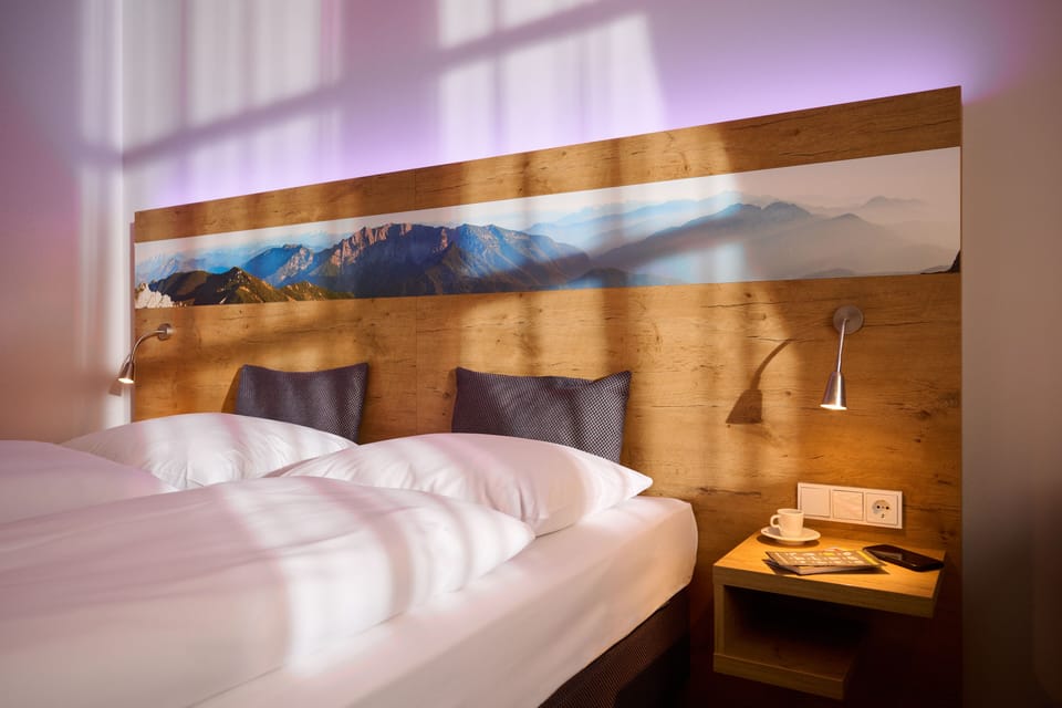 Triple Room | Minibar, in-room safe, blackout drapes, soundproofing