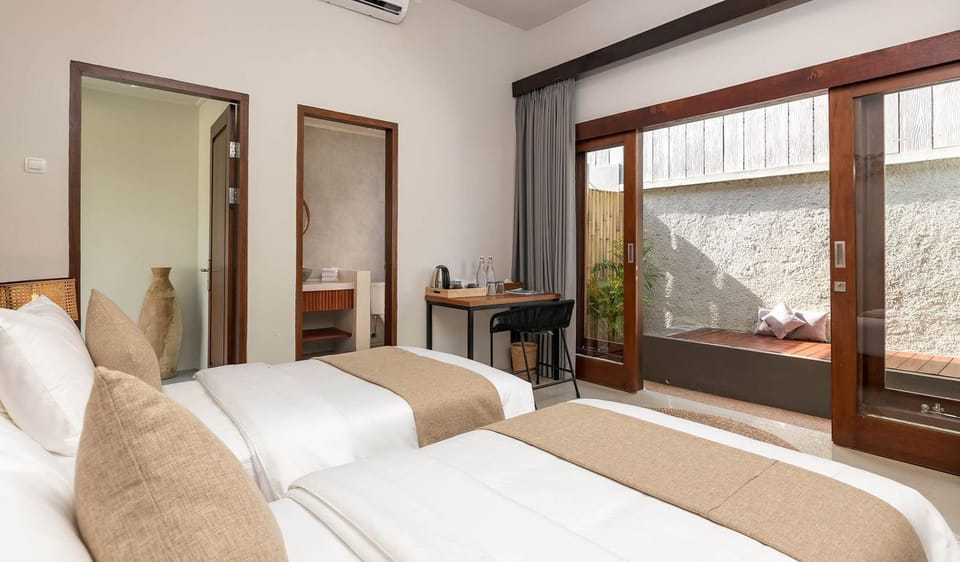Deluxe Bungalow, 2 Twin Beds | In-room safe, blackout drapes, free WiFi, bed sheets