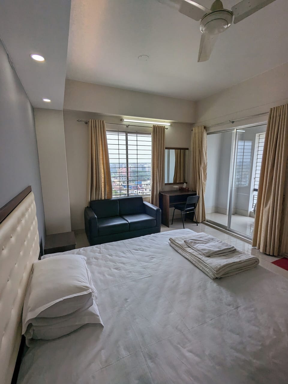 Deluxe Suite, Balcony, City View | Desk, laptop workspace, free WiFi