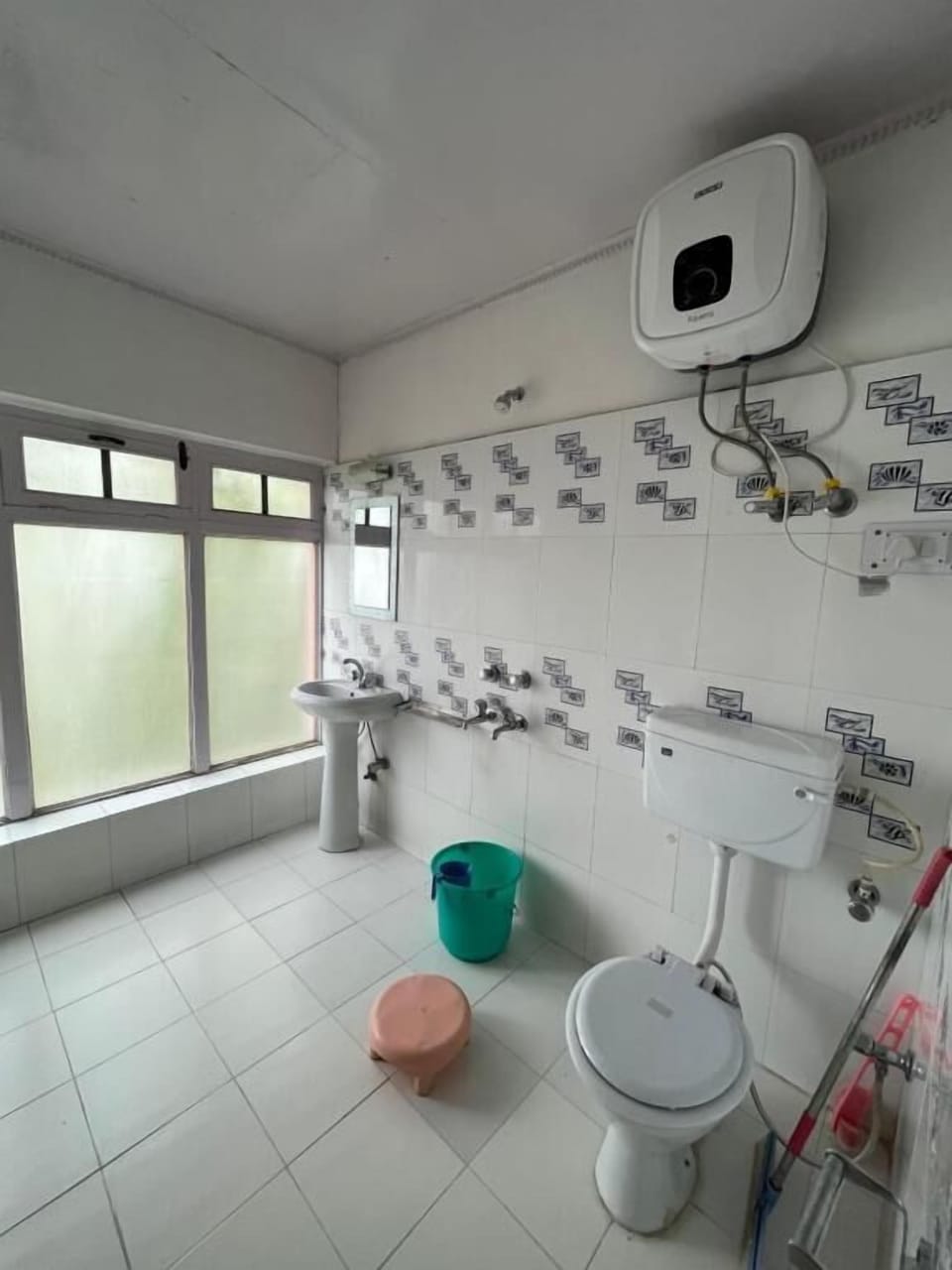 Shower, towels, soap, toilet paper