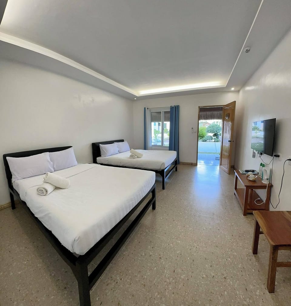 Family Room, Balcony, Garden View | In-room safe, soundproofing, free WiFi