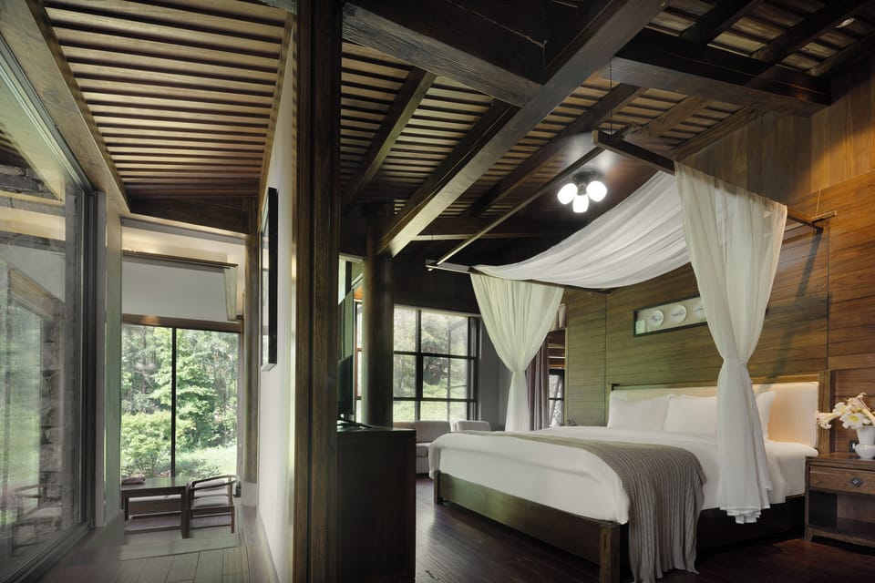 Grand House | Premium bedding, down comforters, memory foam beds, minibar