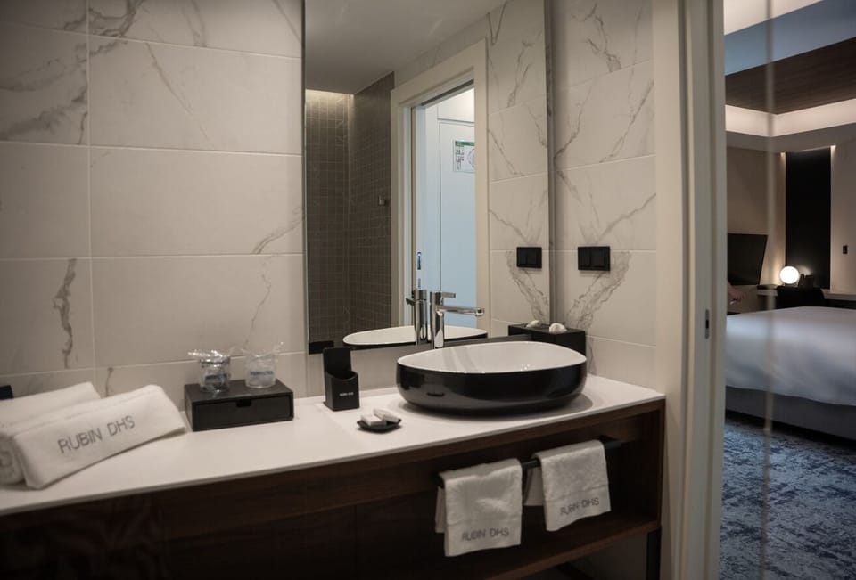 Double Room, City View | Bathroom | Shower, hair dryer, bathrobes, slippers