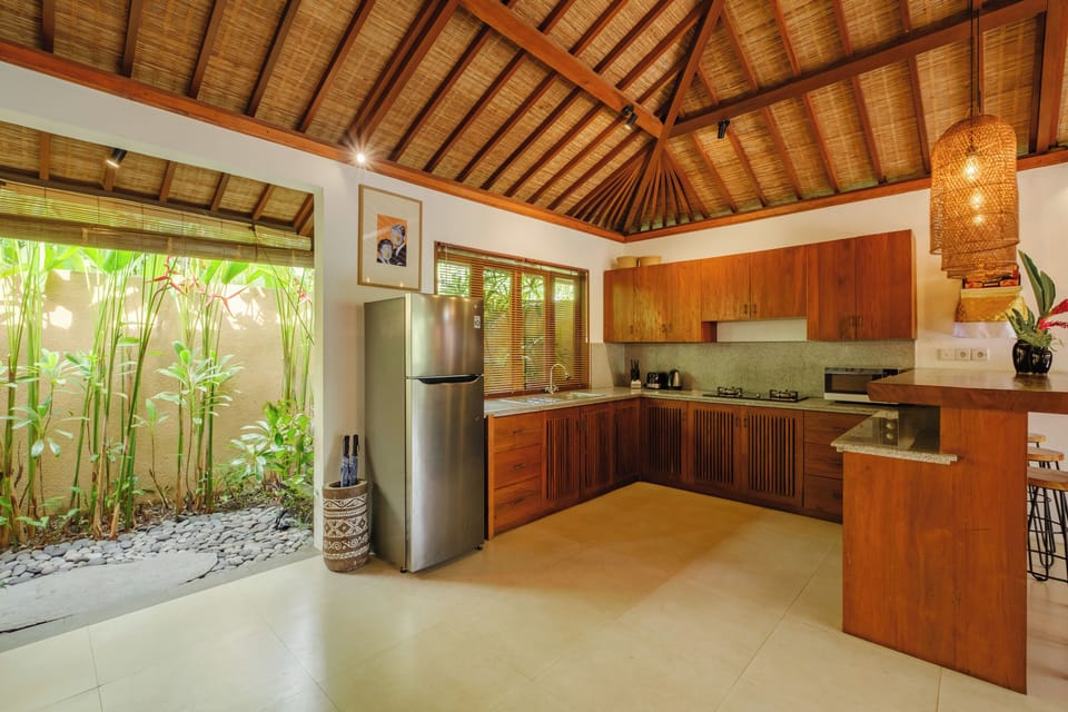 Villa, Balcony, Pool View | Private kitchen | Electric kettle, dining tables